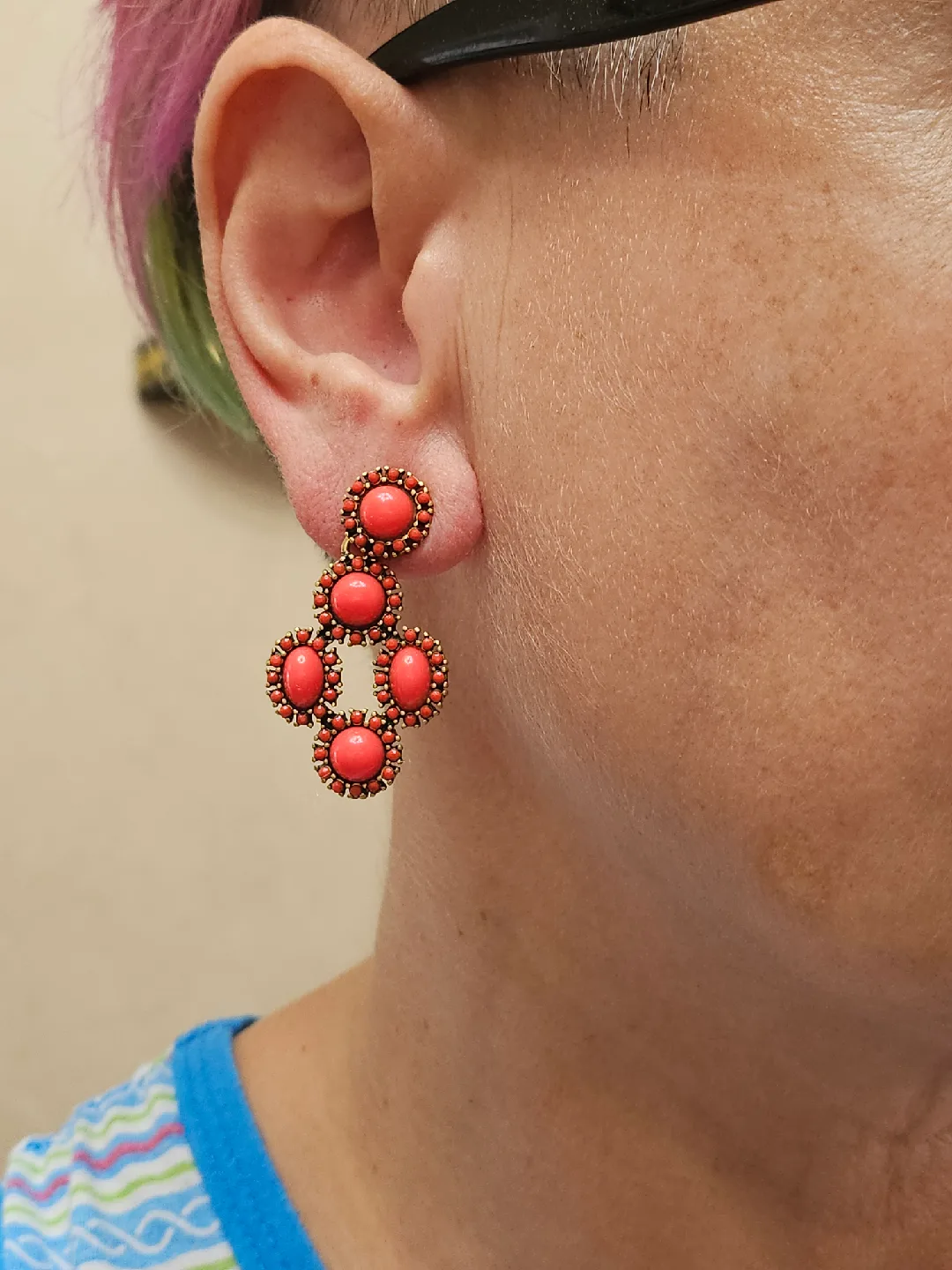 3 pairs of different earrings 1 Stella & Dot Coral Earrings image indicator(10)