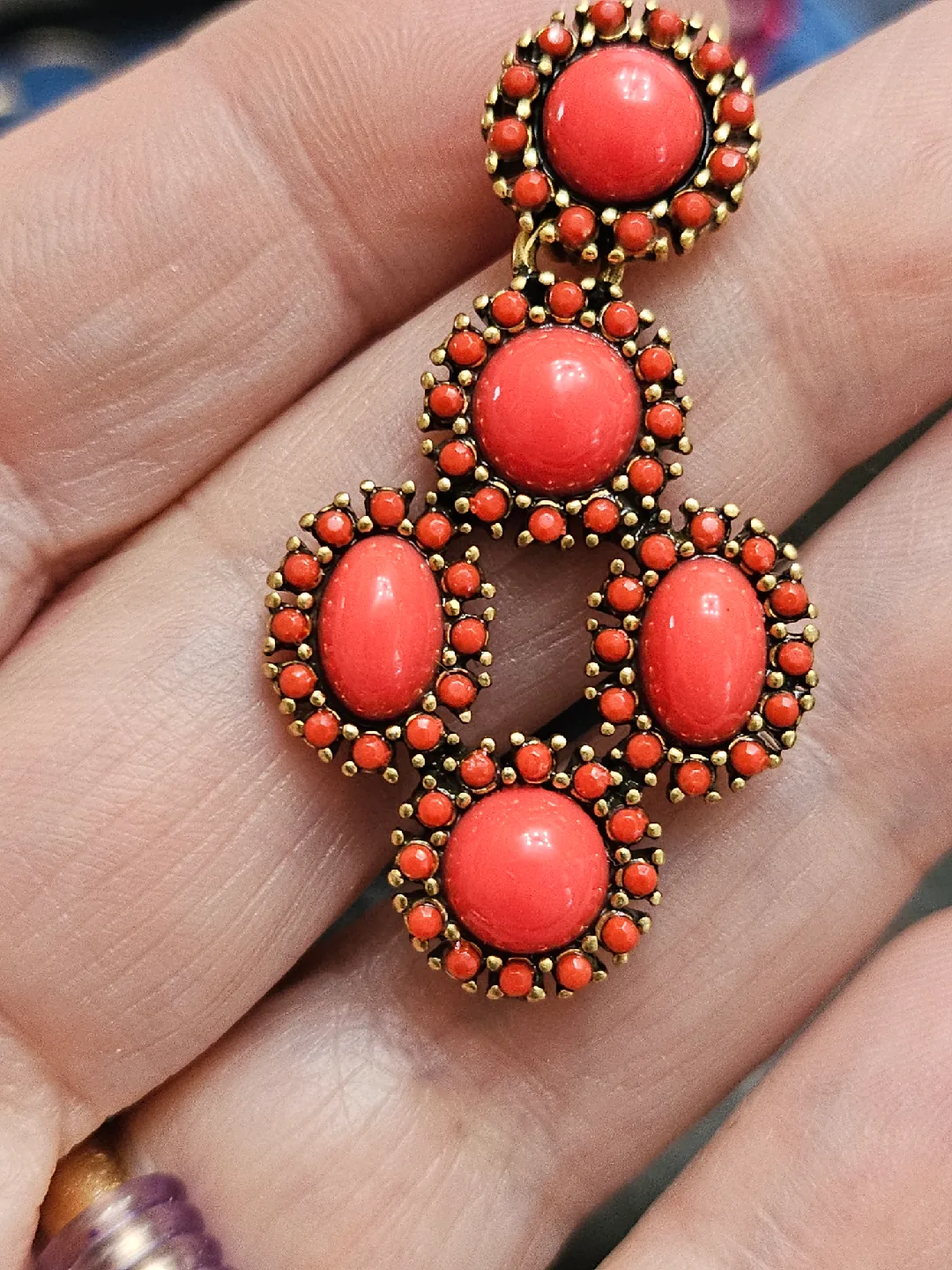 3 pairs of different earrings 1 Stella & Dot Coral Earrings image indicator(4)