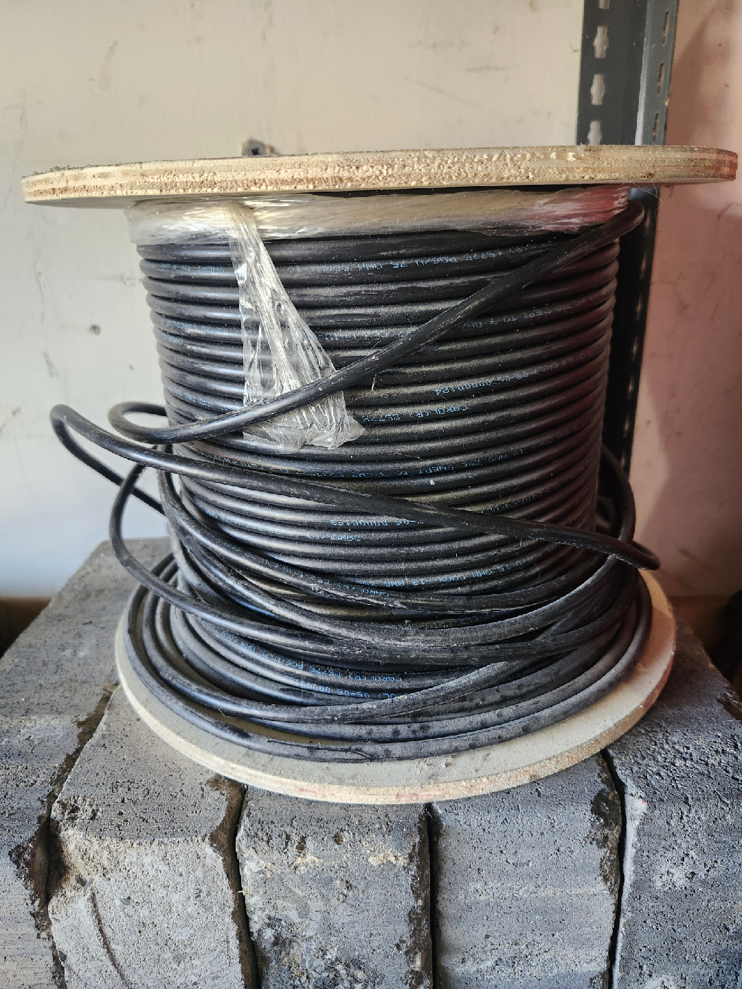 Spool of black cable