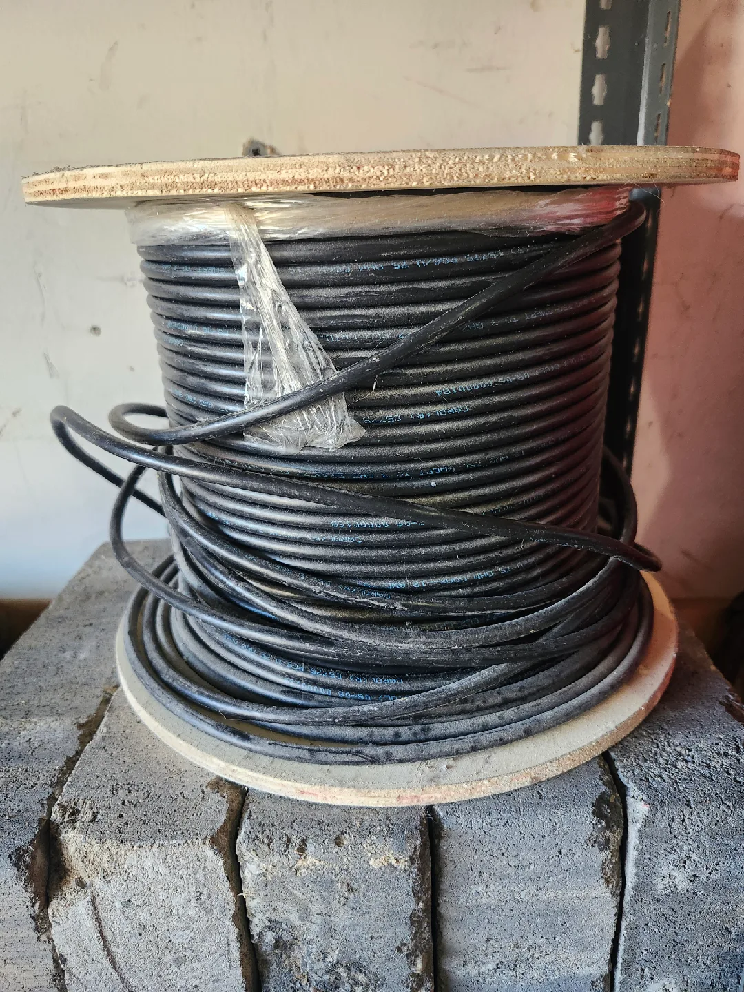 Spool of black cable thumbnail