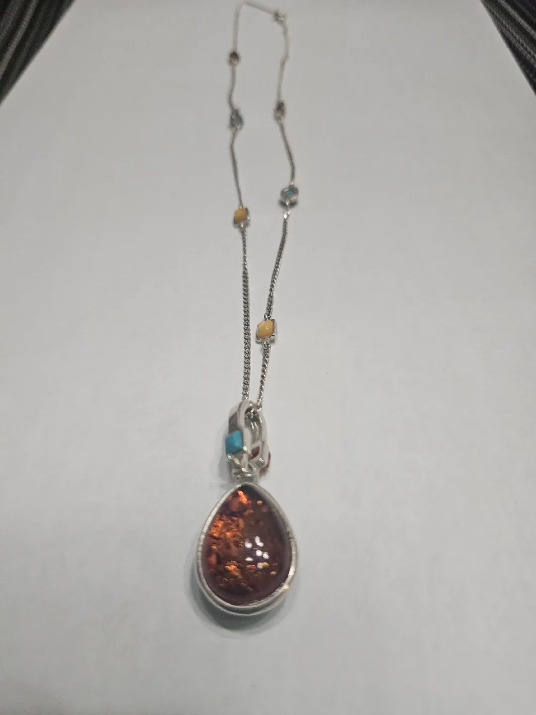 Silver Tone Necklace with Turquoise & Amber Pendants image indicator(3)