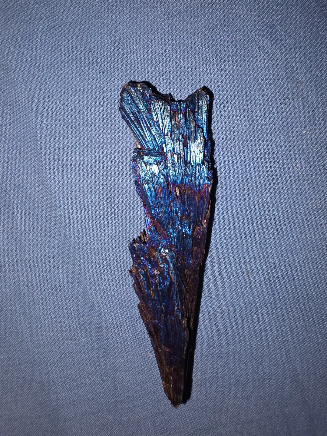 Peacock aura Kyanite. thumbnail