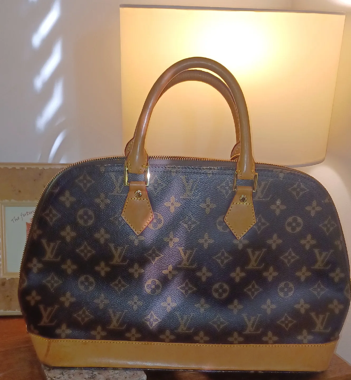 Louis Vuitton Alma Handbag with Lock & Key thumbnail