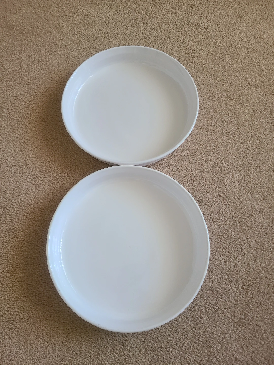 Two White Round Corning Ware Baking Dishes