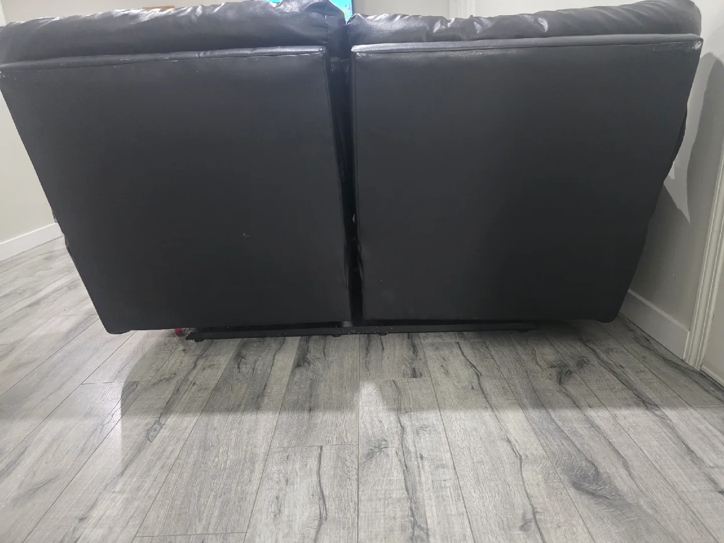 Black Leather Reclining Loveseat image indicator(3)