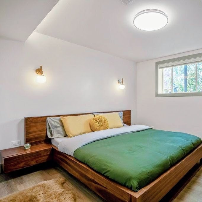 Walnut platform bed frame with built-in nightstands