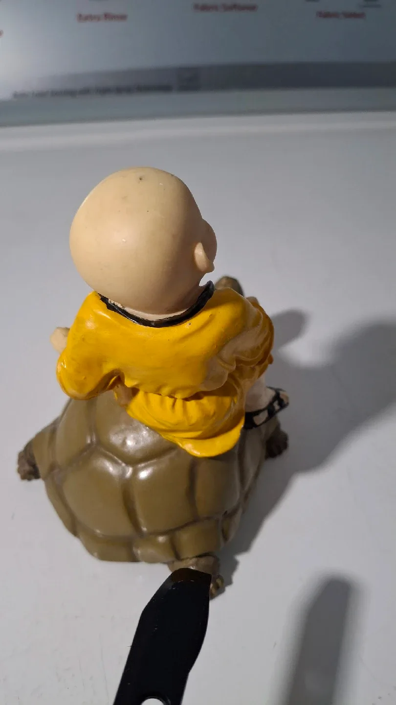 Monk Riding Turtle Figurine image indicator(2)
