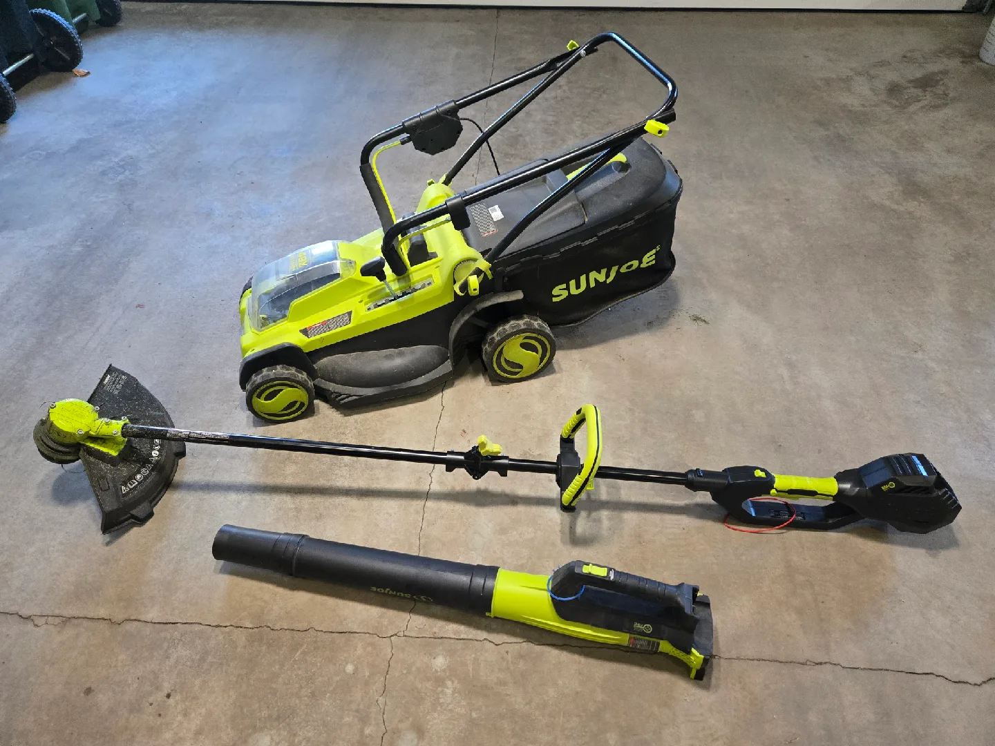 Sun Joe Cordless Lawn Mower, String Trimmer, and Blower Set thumbnail