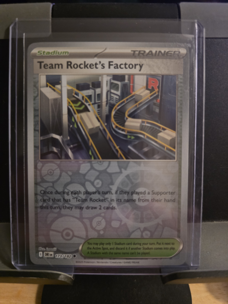Team Rocket's Factory Trainer Card