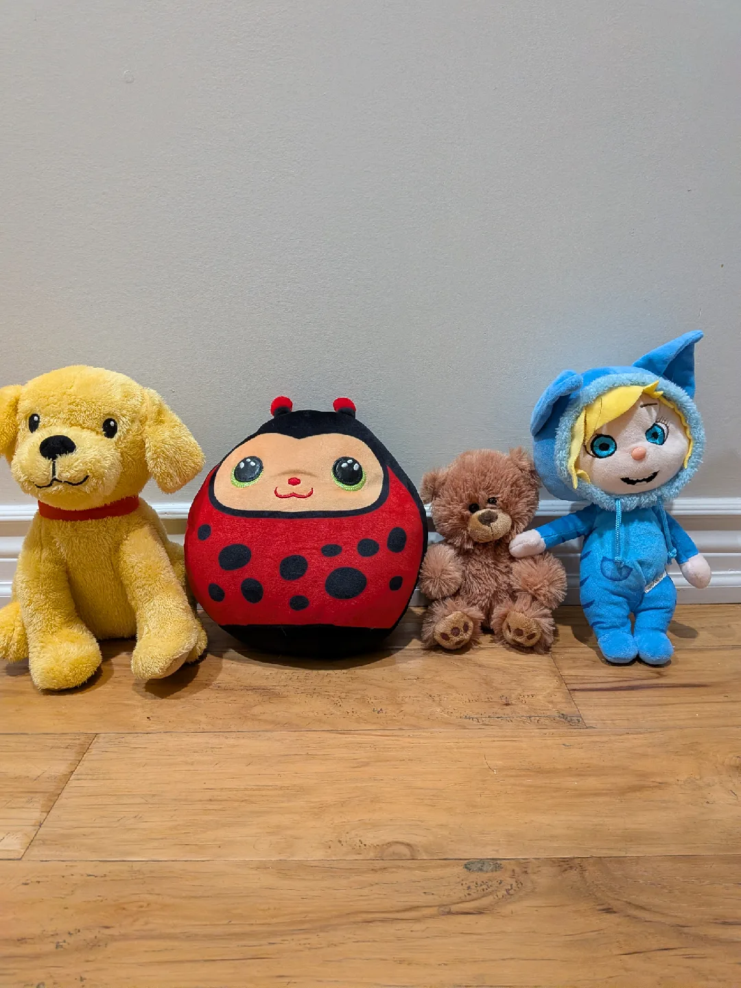 Assorted Plush Toys - Dog, Ladybug, Bear, and Boy thumbnail
