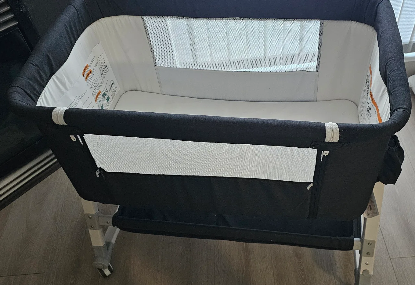 🥕Baby Bassinet with Wheels, Changing Station, and Storage image indicator(2)