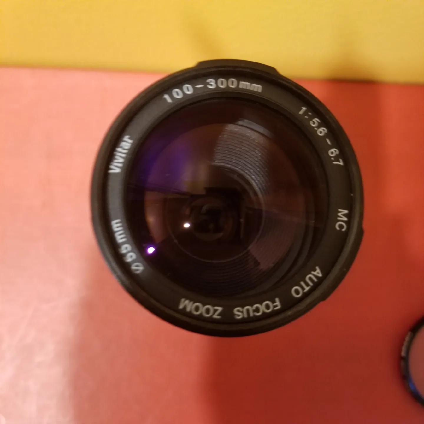 Vivitar 100-300mm Zoom Lens + Tiffen 55mm HAZE-1 Filter image indicator(2)