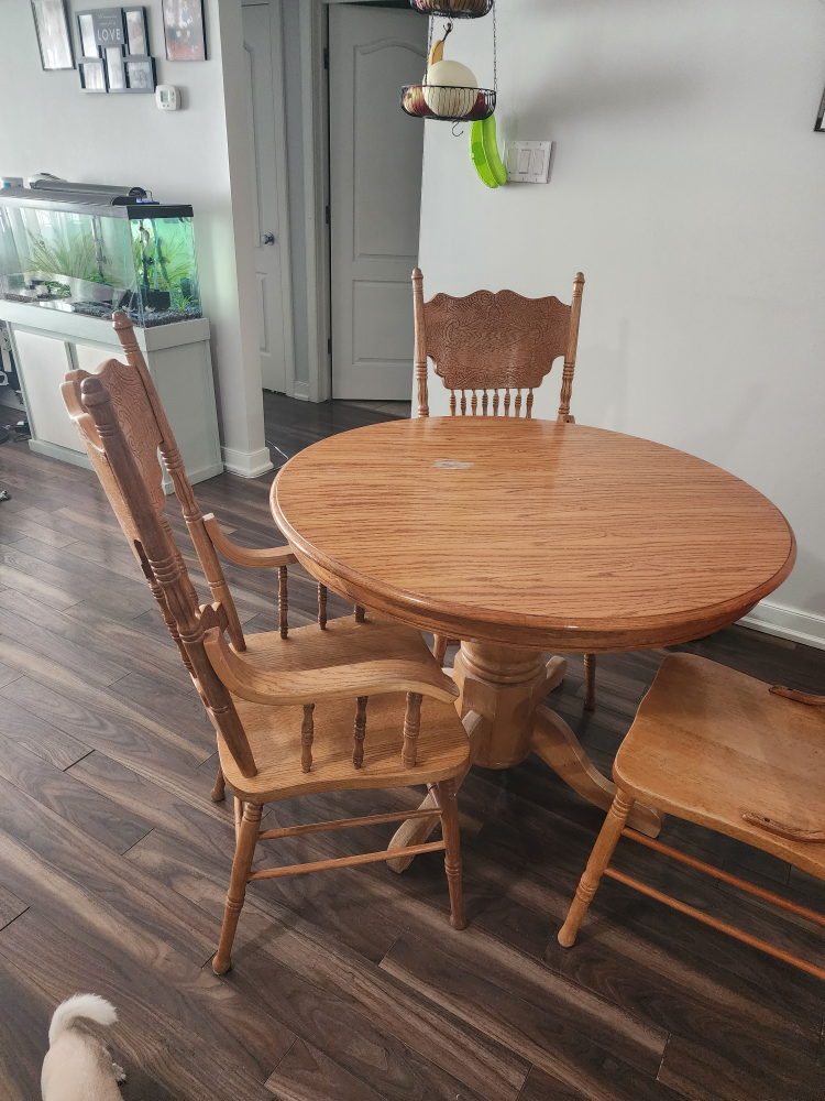 Round Oak Dining Table with Three Chairs