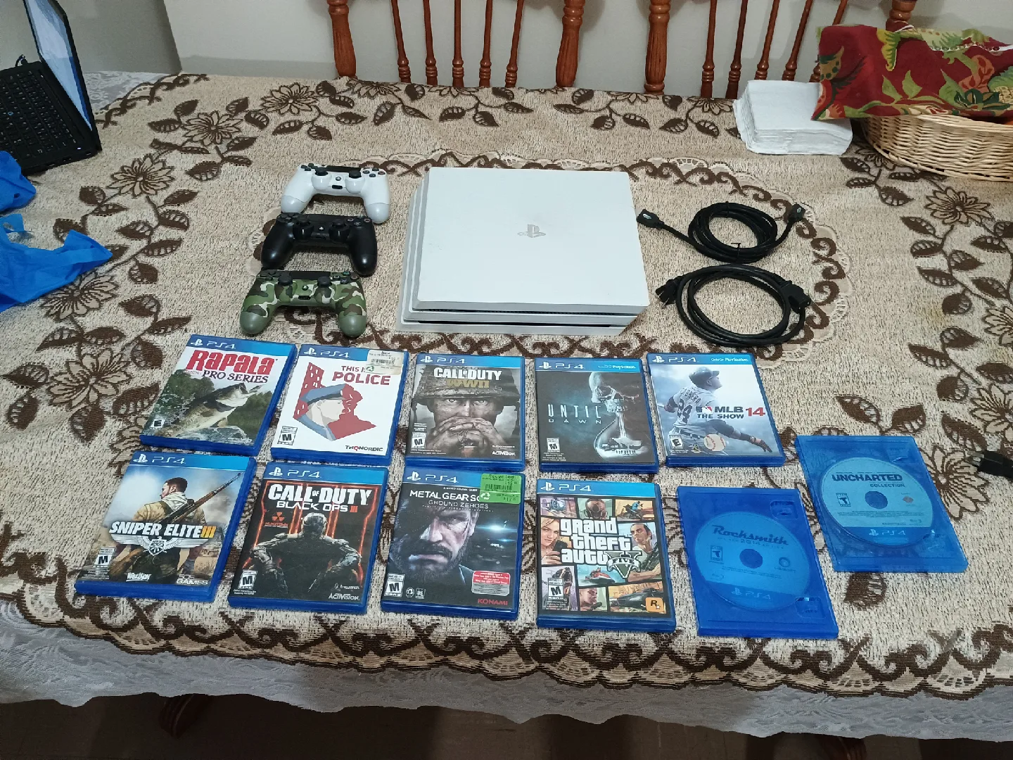 PlayStation 4 pro 1TB with 3 controllers + 11 games image indicator(6)