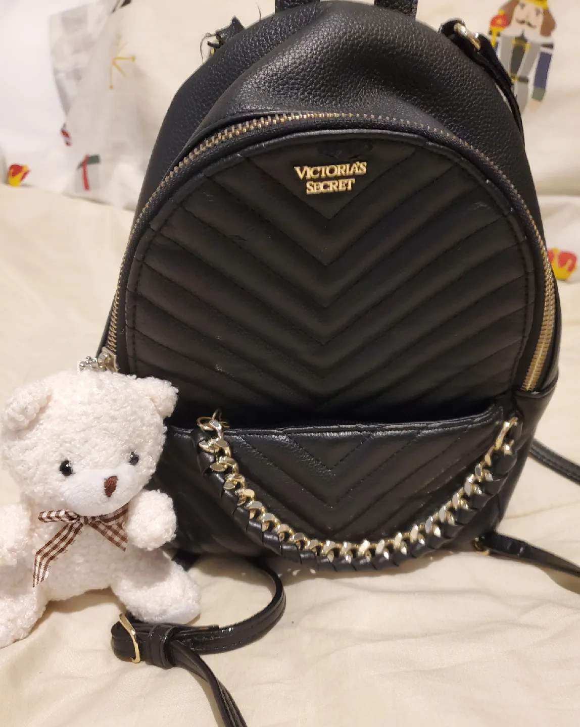 Victorias Secret black mini backpack with gold-like chain accent image indicator(2)