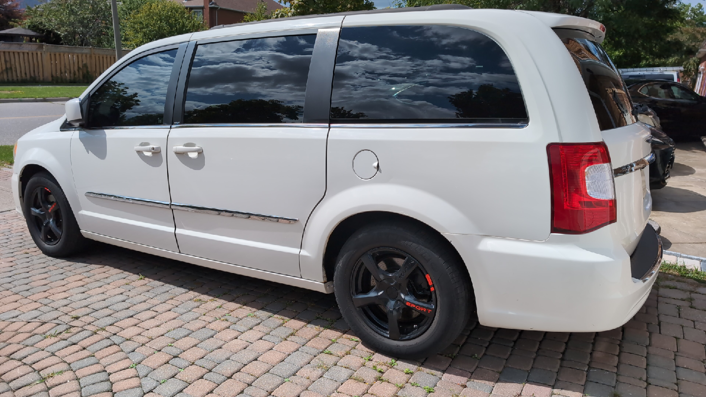 White Chrysler Town & Country Minivan - photo 2