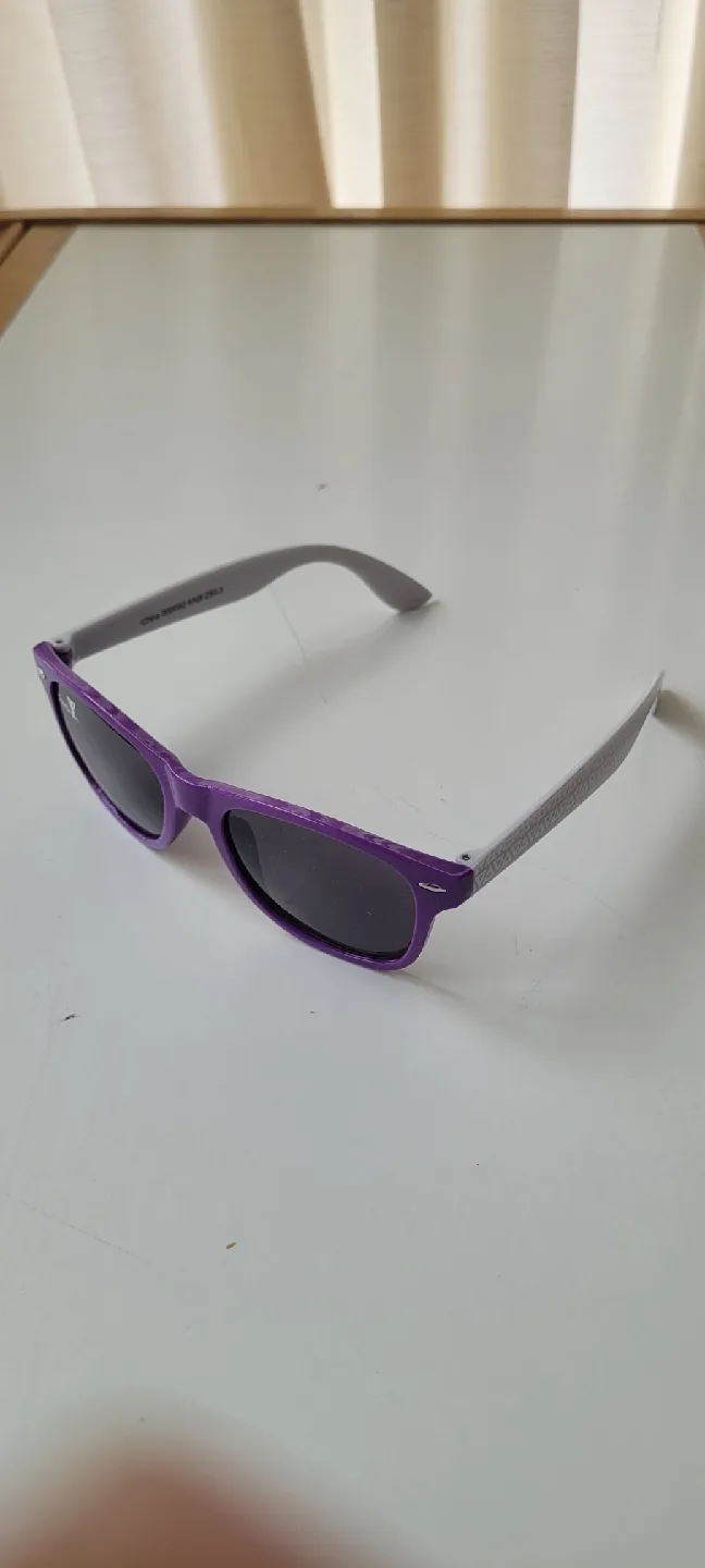 Assorted Toys: Sunglasses, Teddy Bear, Toy Cars image indicator(5)