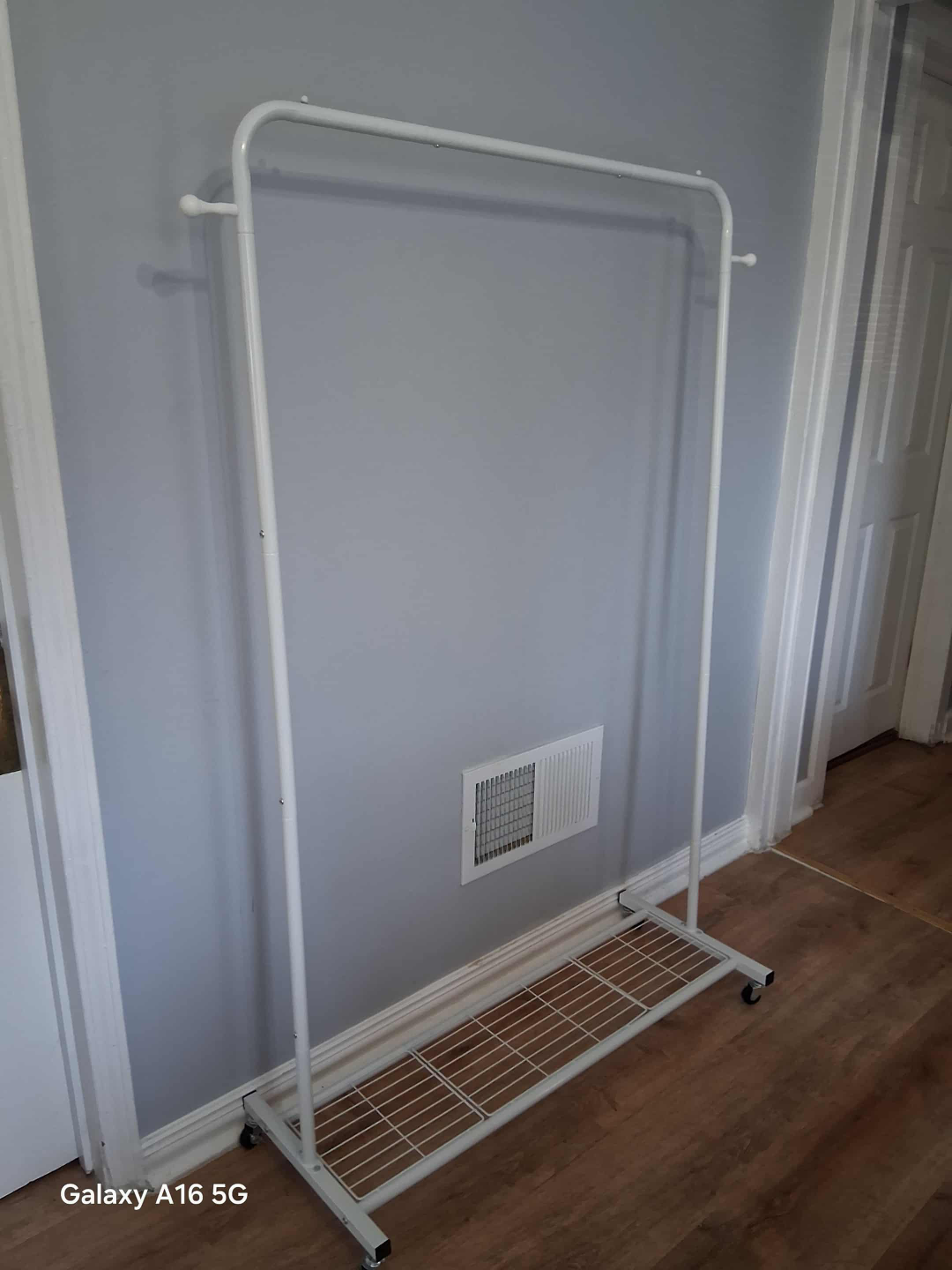 White Metal Rolling Clothes Rack