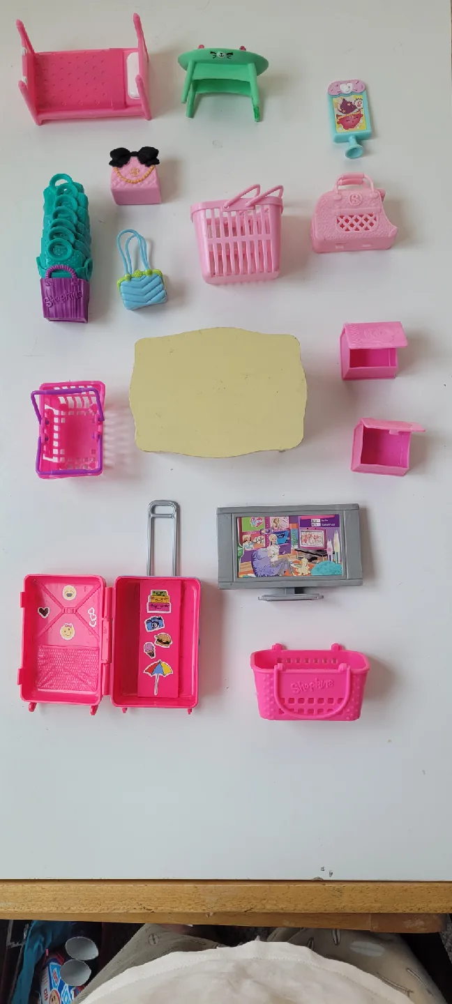 Assorted Toys: Sunglasses, Teddy Bear, Toy Cars image indicator(6)