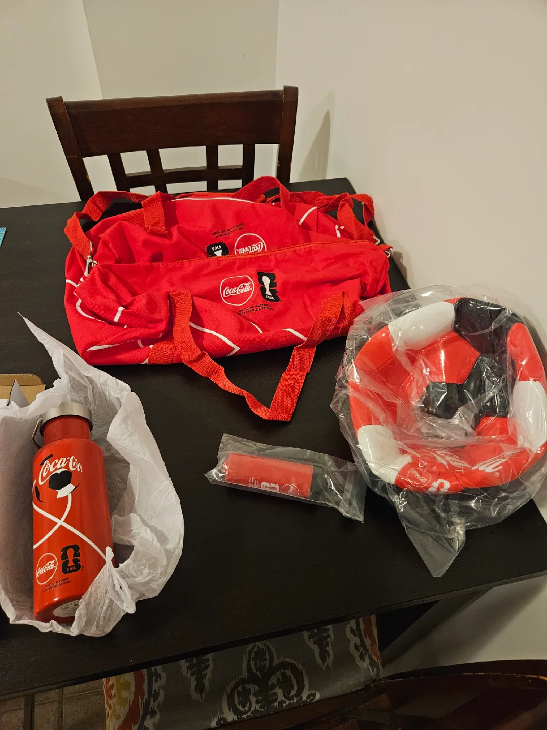 Fifa Coca Cola duffel bag, soccer ball, pump, and bottle
