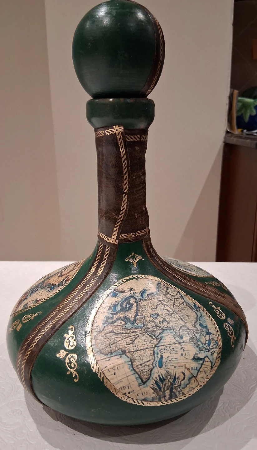 vintage leather wrapped glass bottle