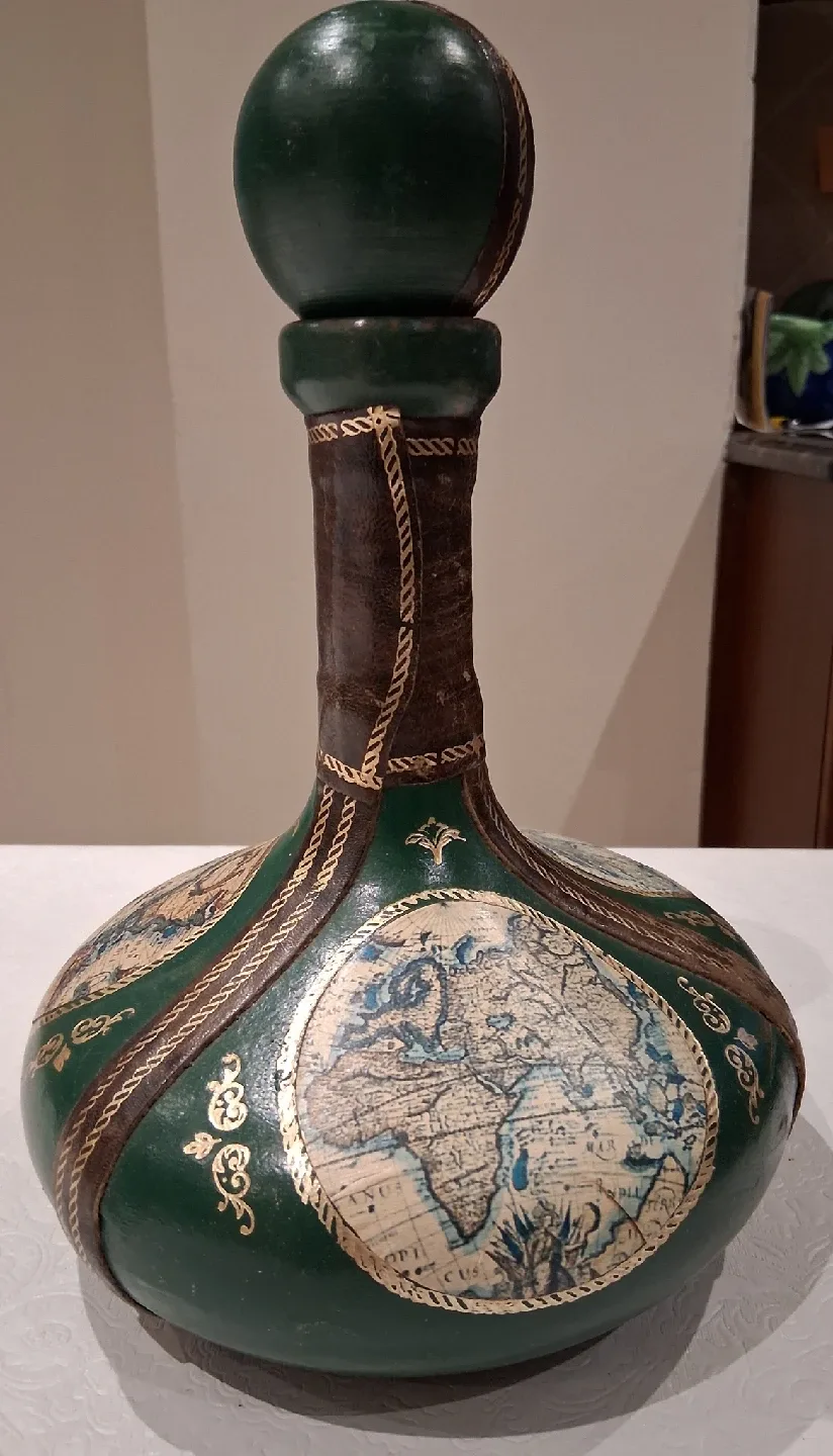 vintage leather wrapped glass bottle