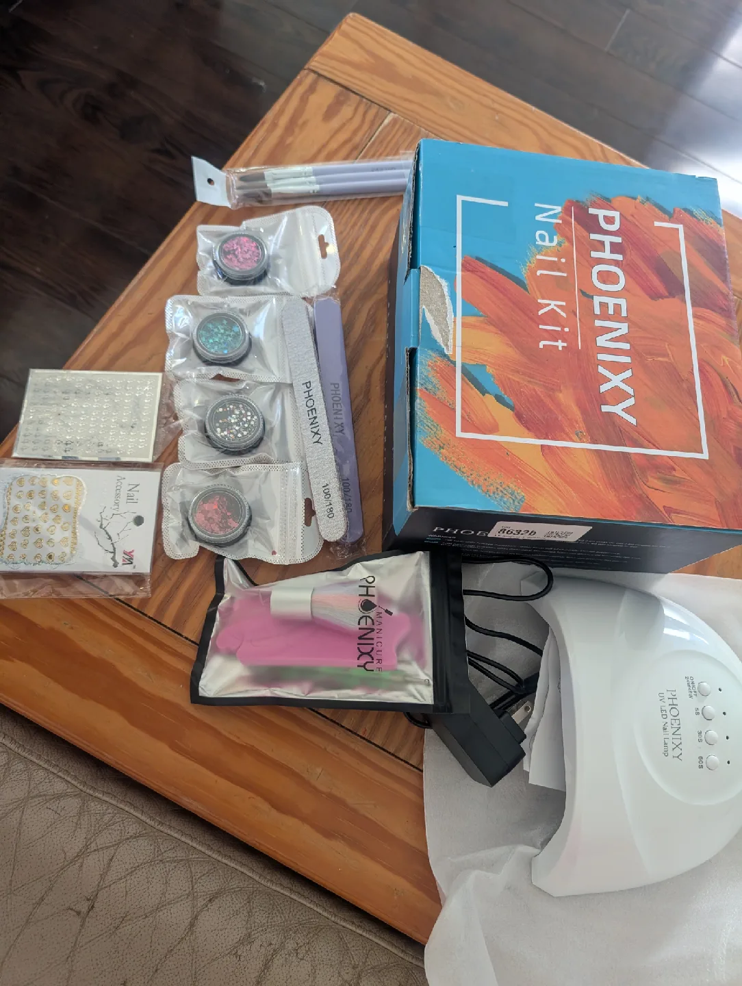 PHOENIXY Nail Kit with 27 Colours & UV LED Lamp image indicator(3)