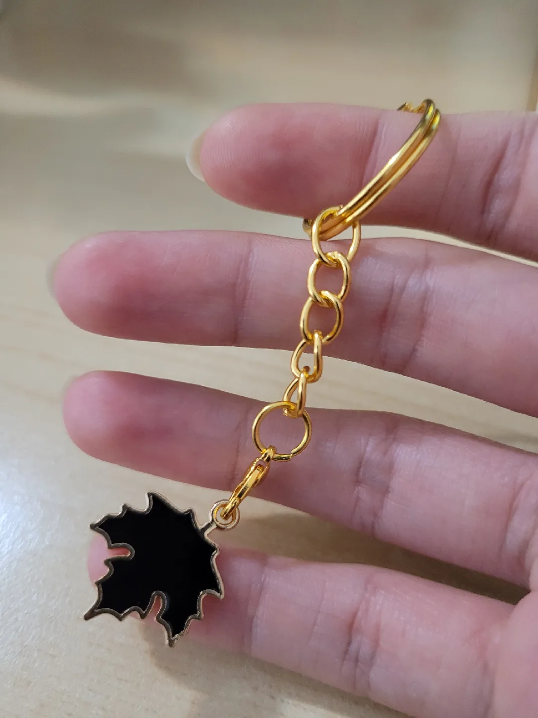 Maple Leaf Keychain - Black & Golden image indicator(5)