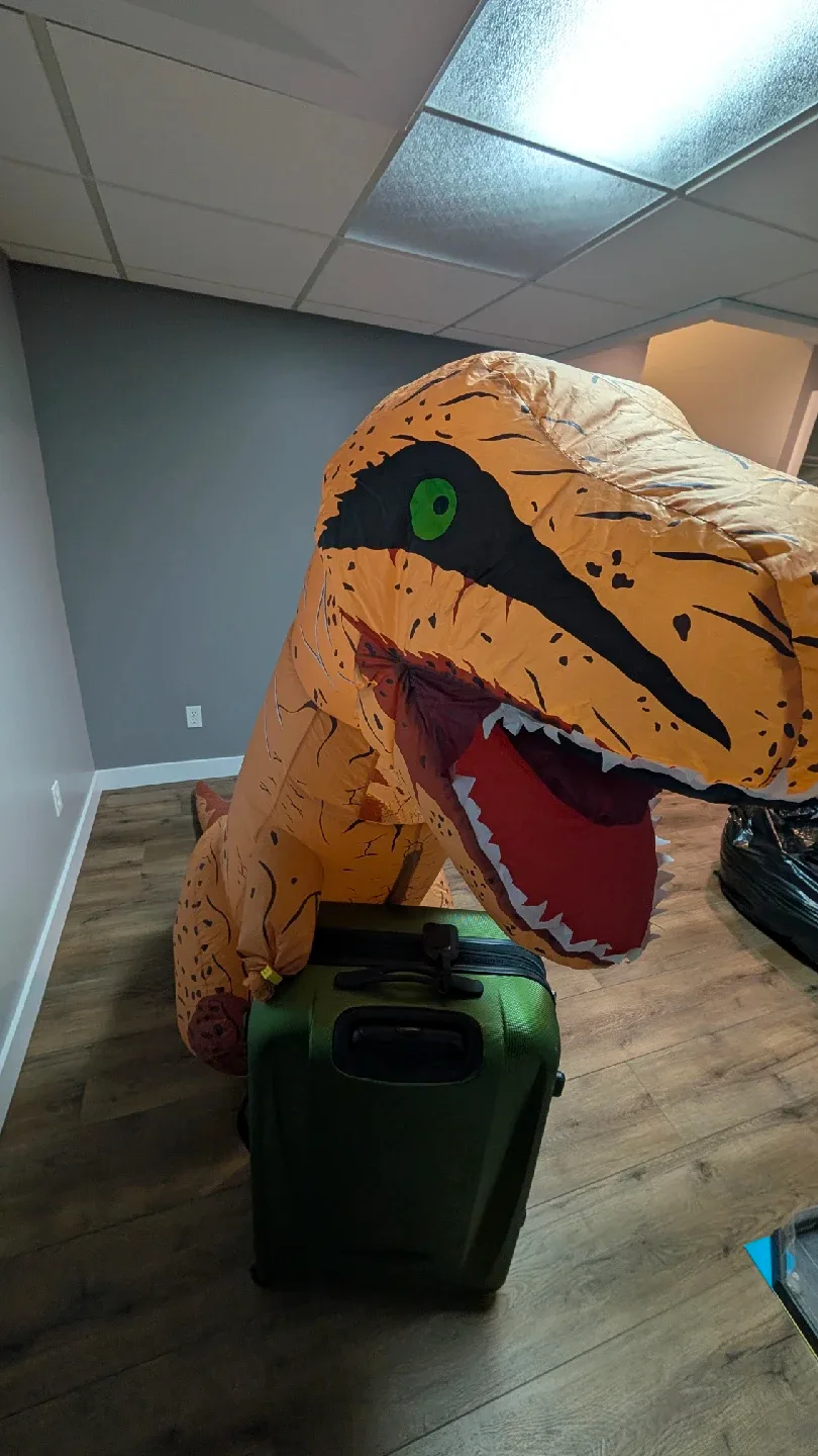 Spirit Halloween Donny The Dino Inflatable Costume image indicator(3)