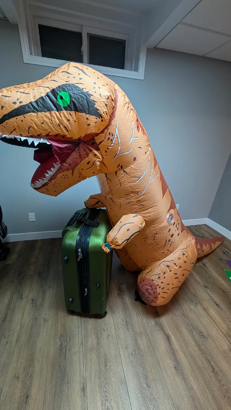 Spirit Halloween Donny The Dino Inflatable Costume image indicator(4)