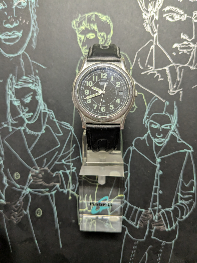 Seiko Watch with Black Leather Band 🧡