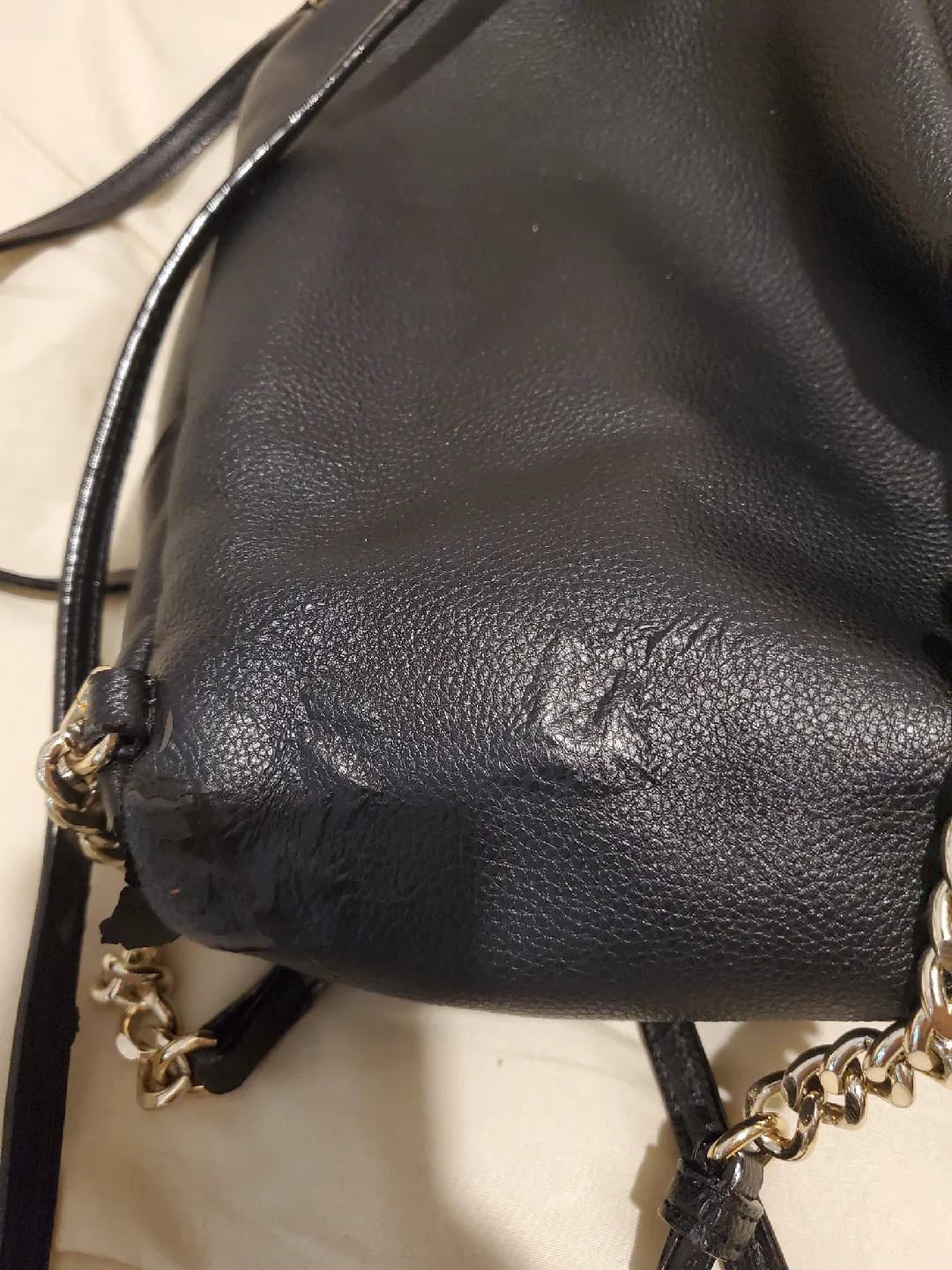 Victorias Secret black mini backpack with gold-like chain accent image indicator(7)