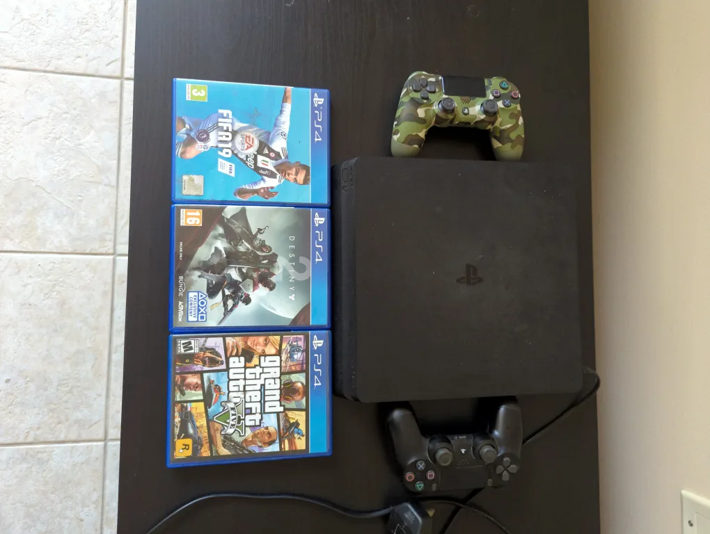 PlayStation 4 with Games and Controllers thumbnail