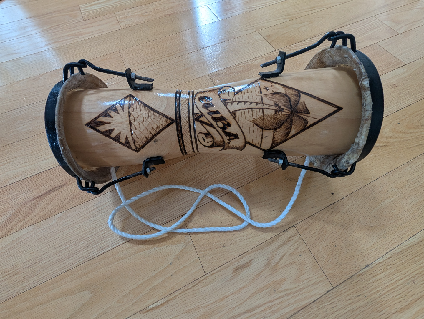 Set of Djembe, Bongo, and Decorative Drums