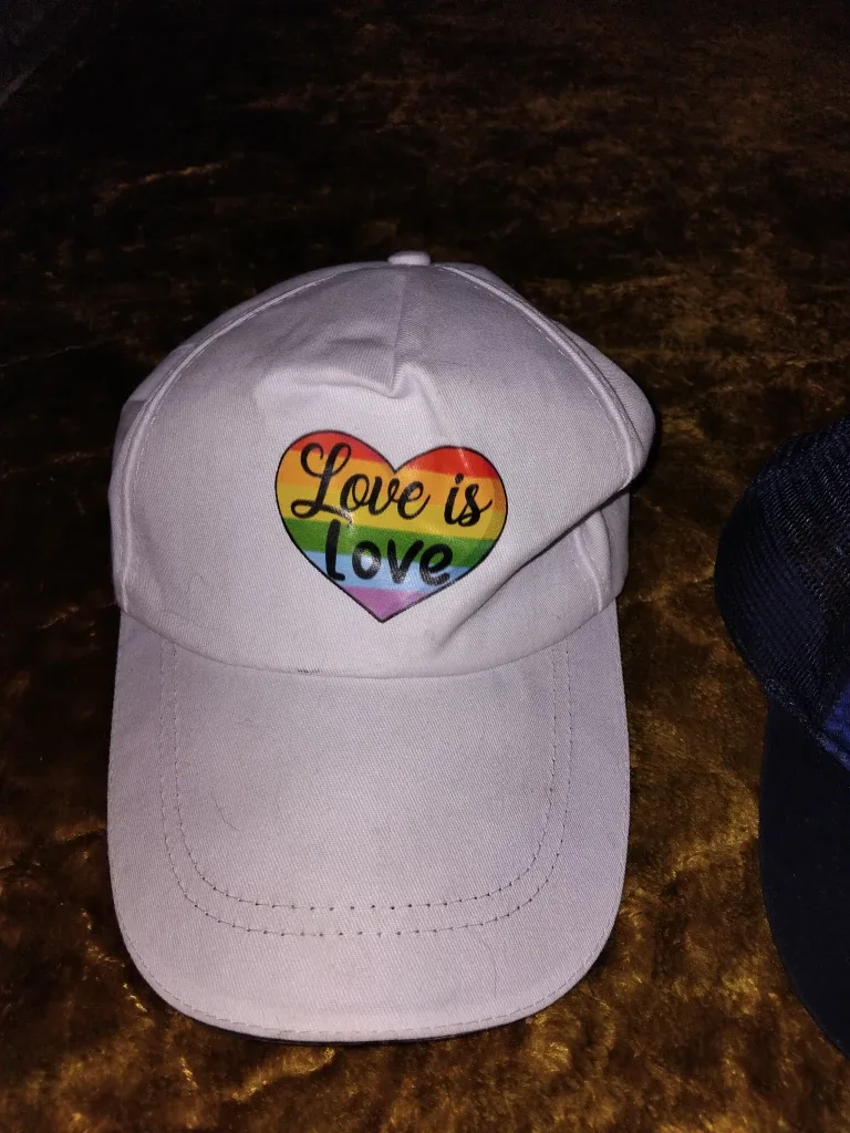 Two Baseball Caps: Love is Love & Wave Riders image indicator(2)