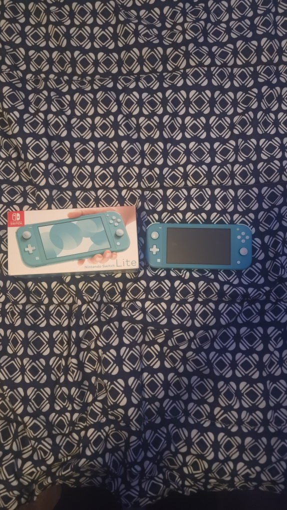 Nintendo Switch Lite Turquoise And Games Trading up
