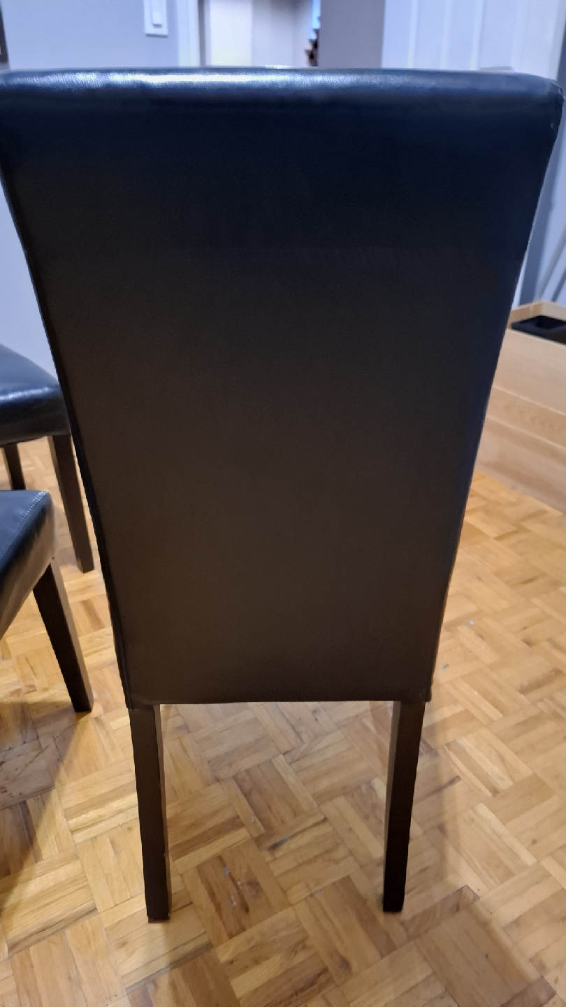 Round matt black wooden dining table with 3 black chairs - photo 4