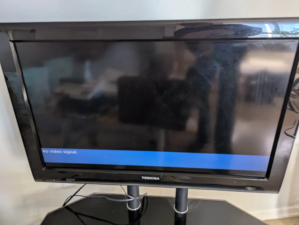 32-in Toshiba flat screen with Toshiba DVD player and stand image indicator(6)