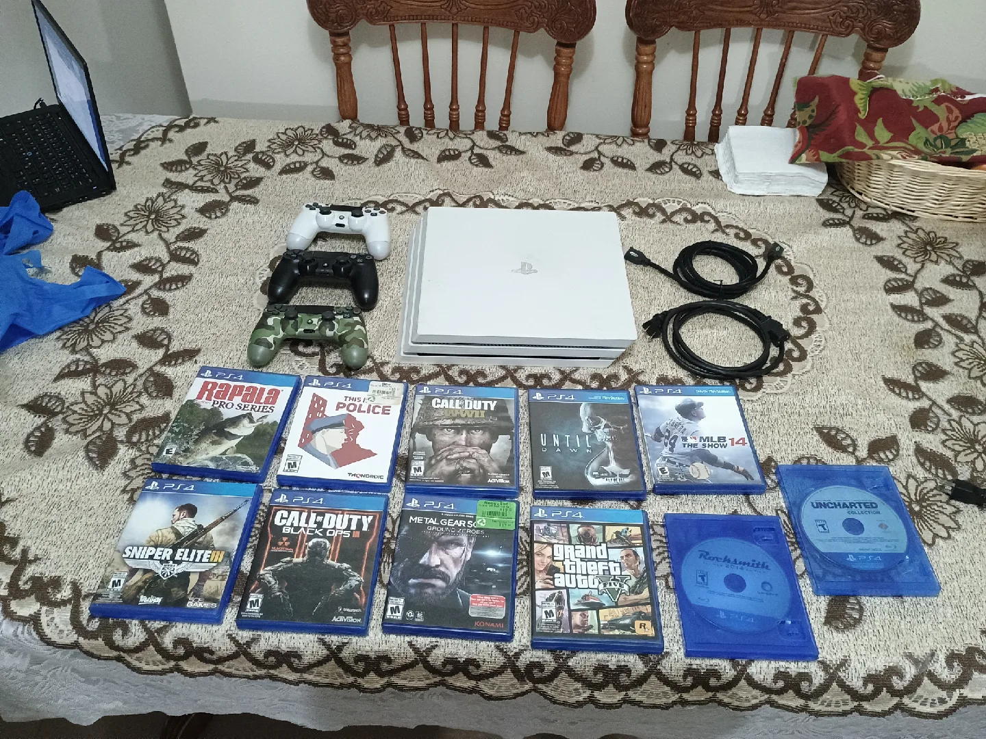 PlayStation 4 pro 1TB with 3 controllers + 11 games