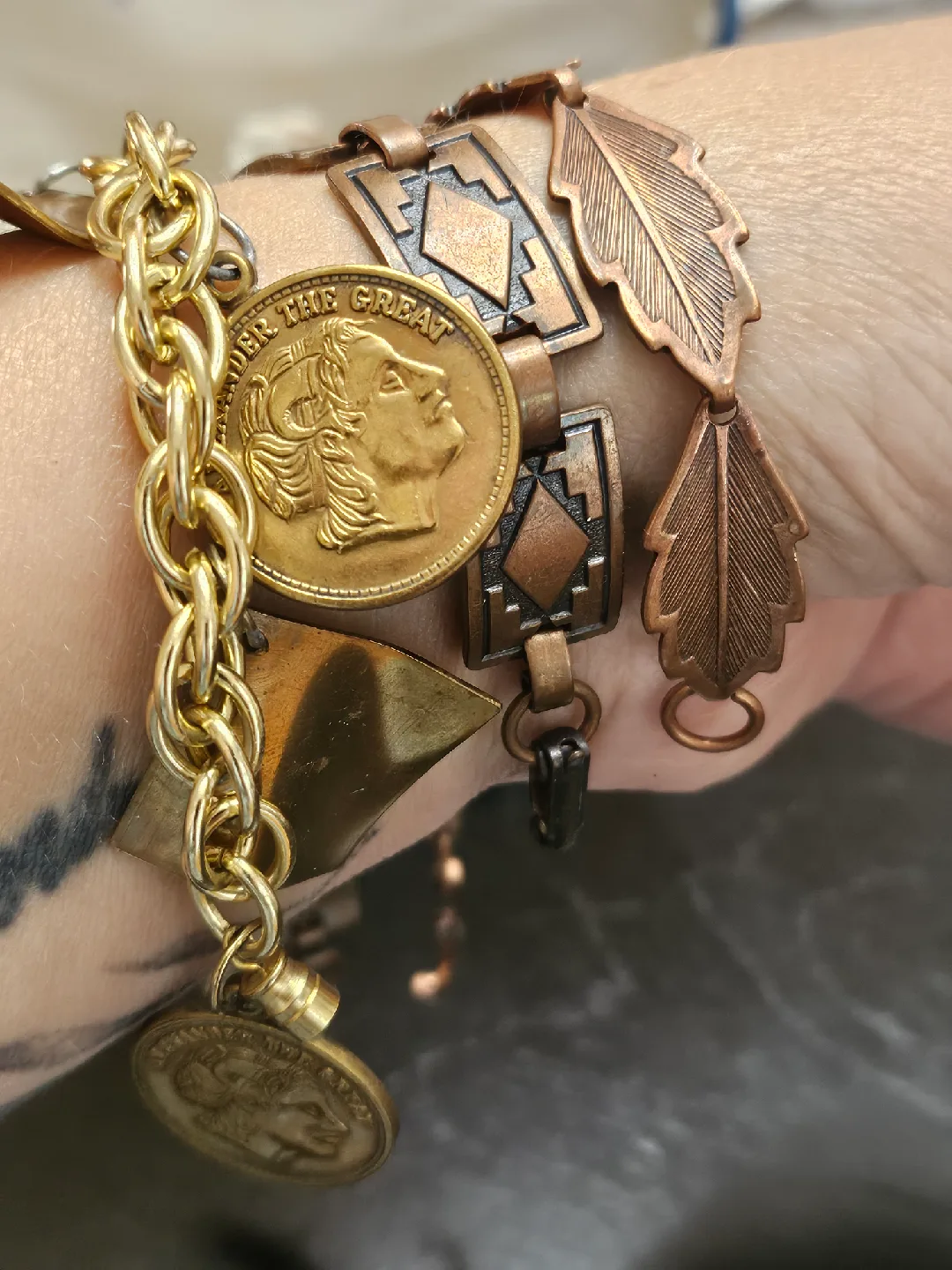 Vintage 3 different bracelets, copper and gold tone with coins image indicator(10)