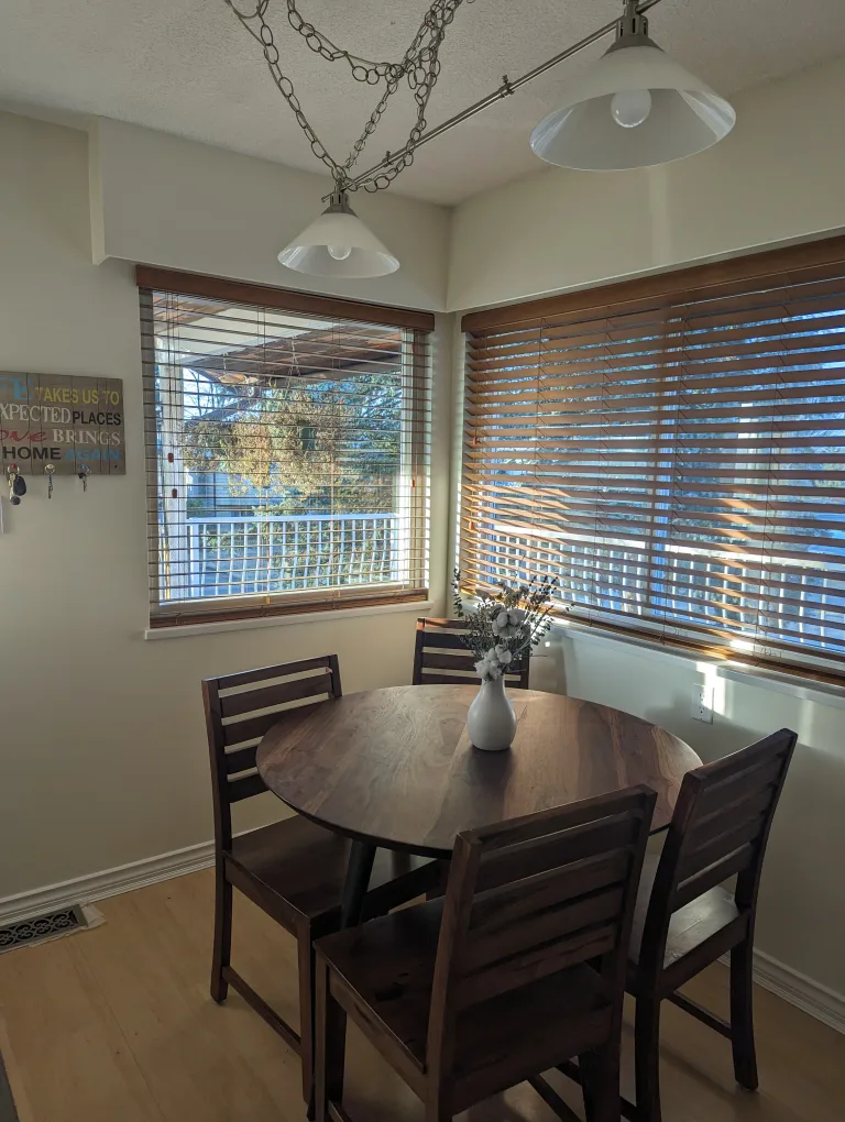 Rosewood dining table and 4 chairs