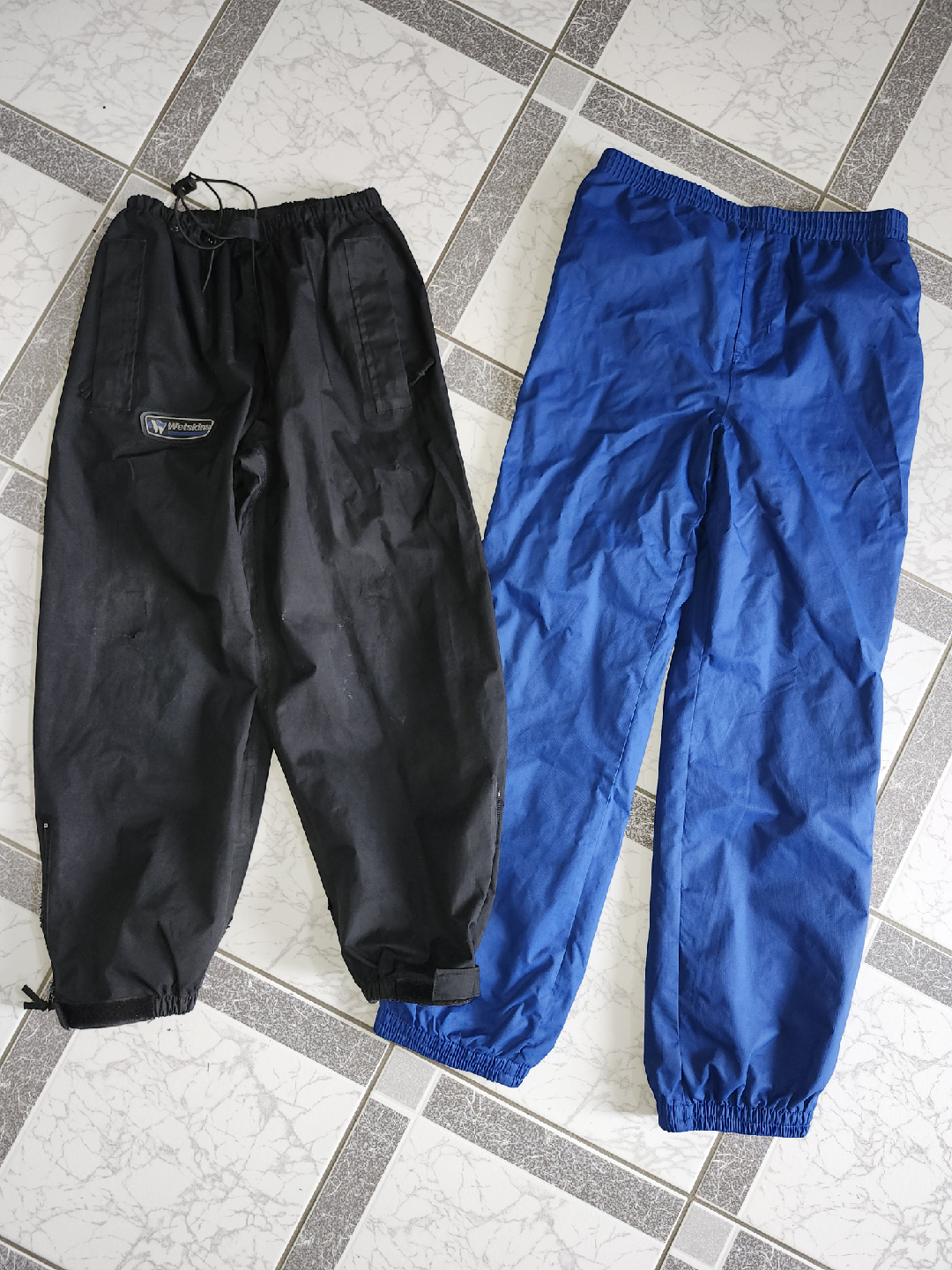 2 pairs of kids size 10/12 Large splash pants.