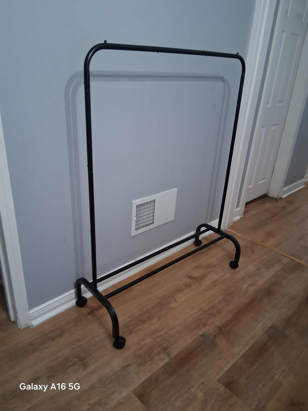 Black Metal Rolling Clothing Rack - photo 4
