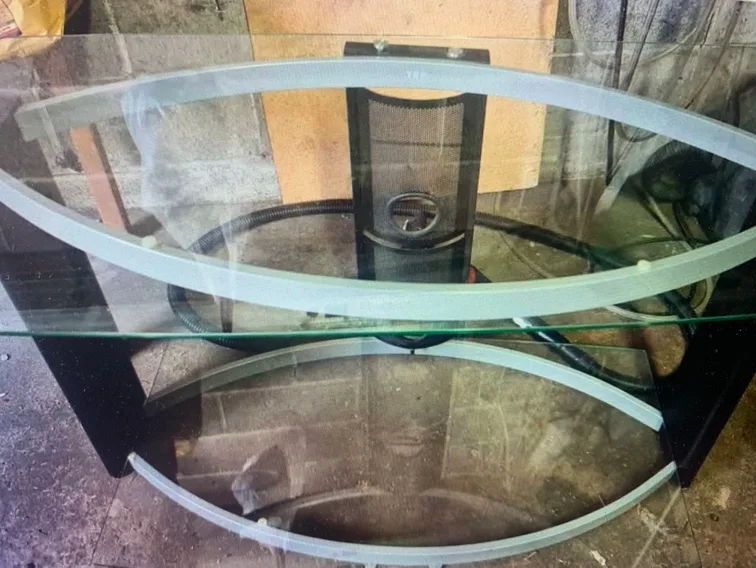 2 leather chairs $60. Ea. Tv. Stand & tv $25. image indicator(4)