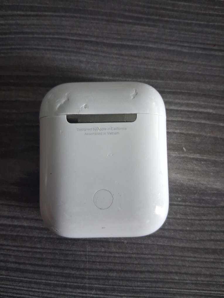 Apple AirPods with Charging Case - photo 2