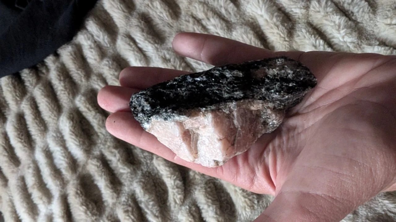 Large raw black tourmaline with pink feldspar and pink quartz. image indicator(3)