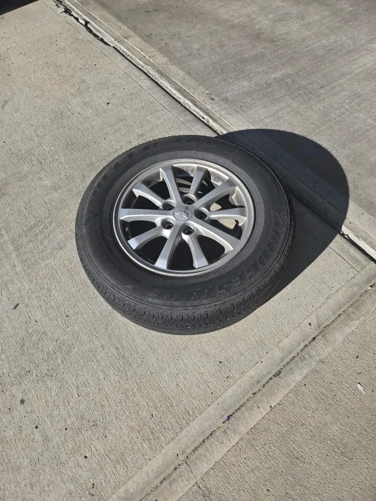 All Season Bridgestone Tire on Mitsubishi RVR Rim image indicator(3)