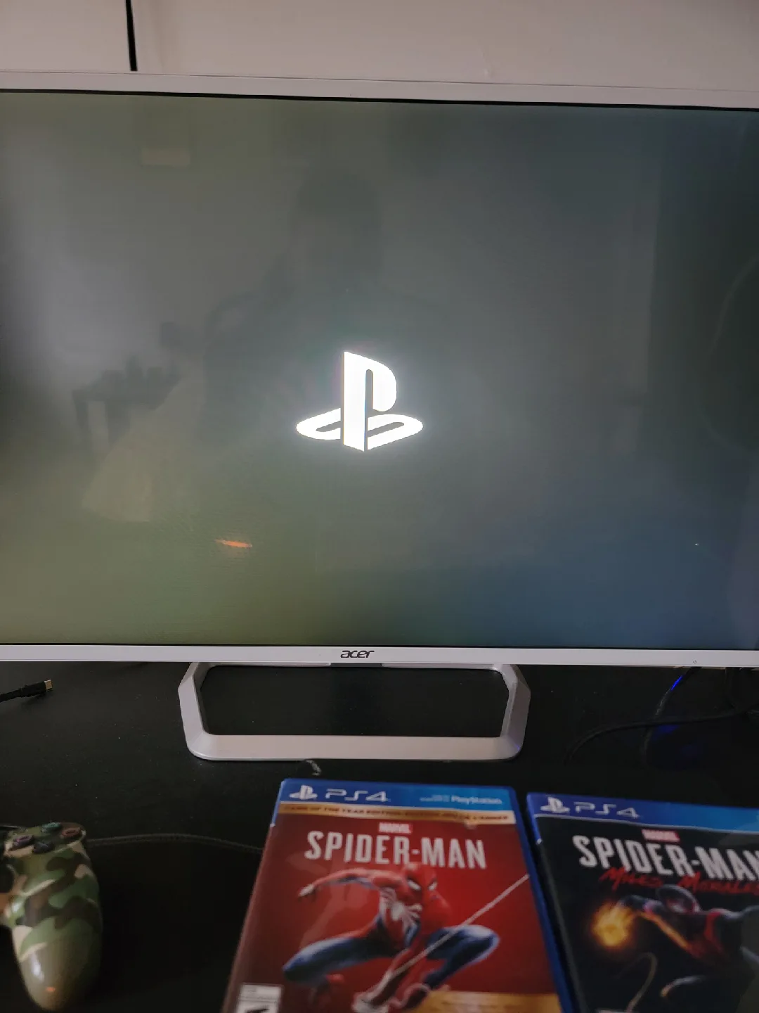 PlayStation 4 with Spider-Man Games image indicator(2)