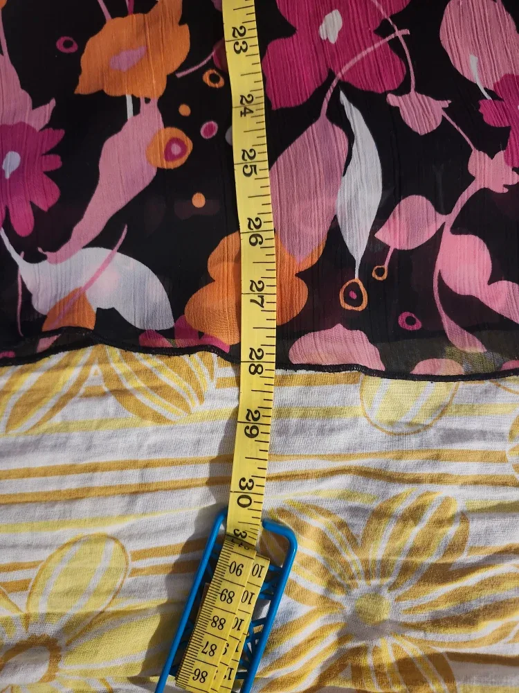 Black and pink floral babydoll top with a bow at the back image indicator(7)