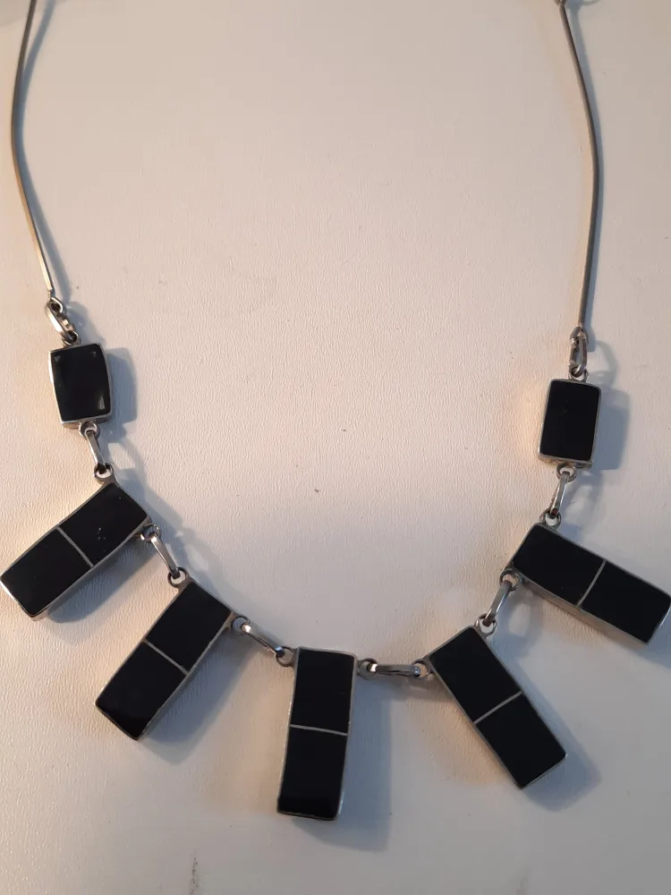 Necklace Lot: Black, White, Silver image indicator(3)